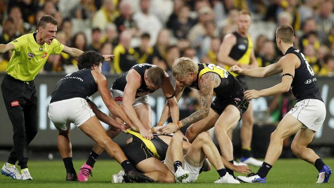 Players remonstrate as tensions run high in the opening match of 2021. Picture: Getty Images