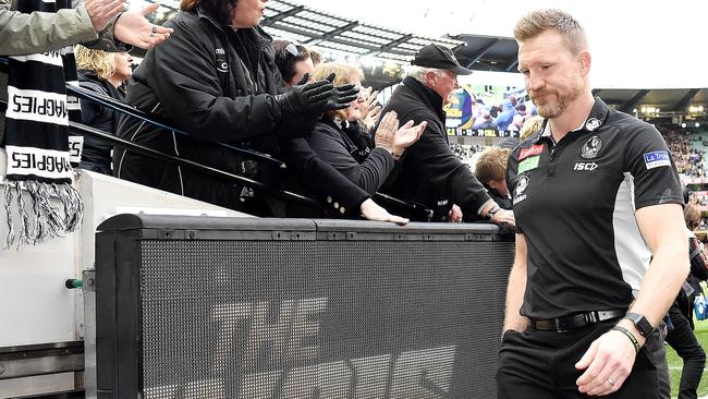 Nathan Buckley heads into the rooms after the loss. Picture: Nicole Garmston