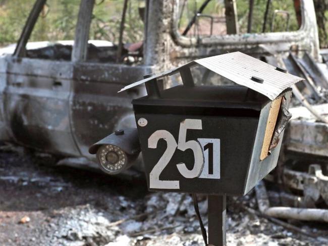 A burnt out car at the Train’s property.