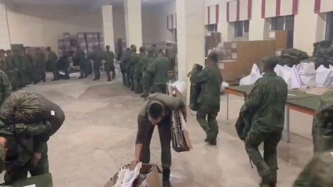 North Korean soldiers receiving uniforms and equipment at a Russian training base. Picture: Ukrainian Centre for Strategic Communication and Information Security