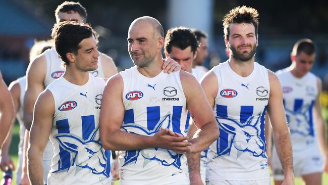 Jy Simpkin and Cunnington walk off Adelaide Oval. Picture: Mark Brake/Getty Images