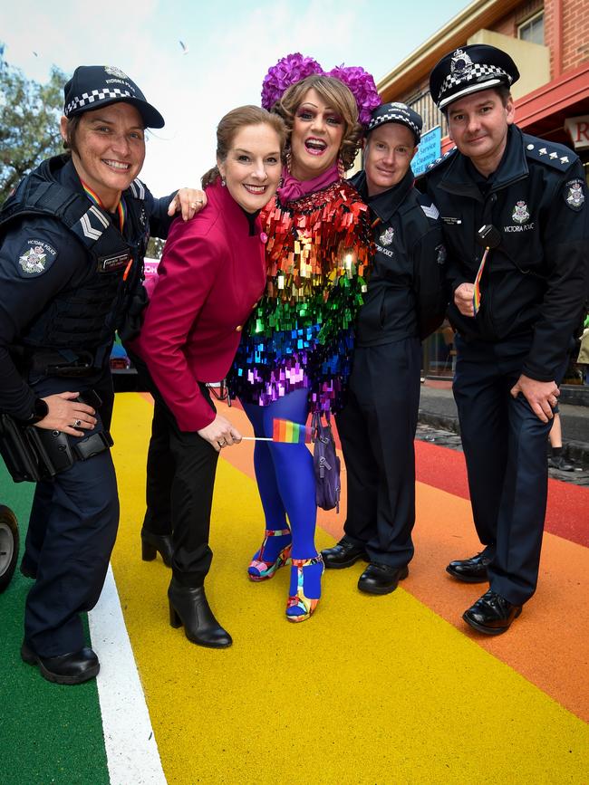 Former Mayor Bernadene Voss with Dolly Diamond and police officers at the unveiling of St Kilda’s rainbow road in 2018. Picture: Penny Stephens