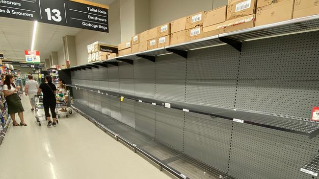 The shelves of many super markets in Brisbane are running low on toilet paper, tissues and hand sanitisers due to panic buying caused by the corona virus. Photo taken at Woolworths at the Gasworks. AAP Image/Richard Goslingg