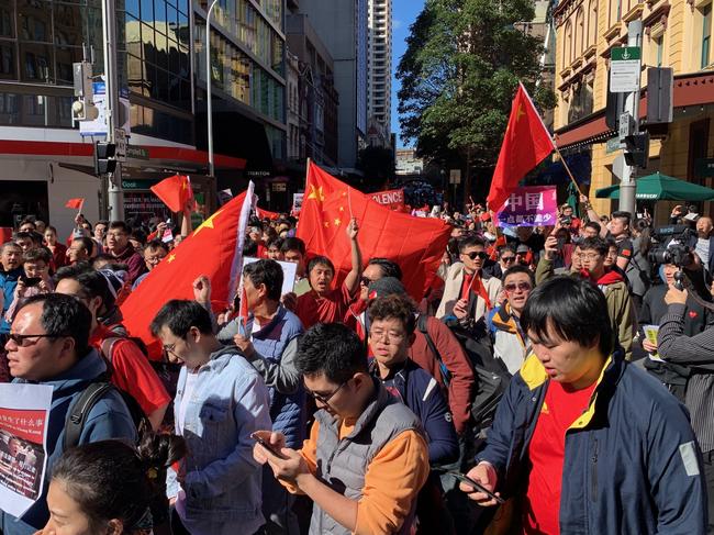 Pro-China activists at a rally along George St, Sydney. Picture: Tim Hunter