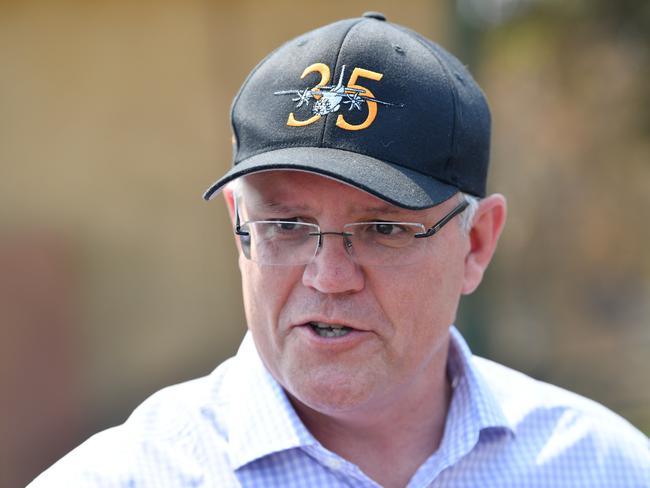 Prime Minister Scott Morrison visits a fire damaged property on Stokes Bay on Kangaroo Island.