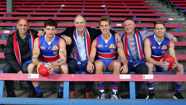 Footscray greats Tony Liberatore, Steve Wallis and Mark Hunter with their sons, Bulldogs players Tom, Mitch and Lachie, at Whitten Oval. Picture: Andrew Tauber