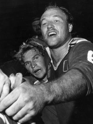 Wally Lewis hugs man of the match Langer on debut in 1987.