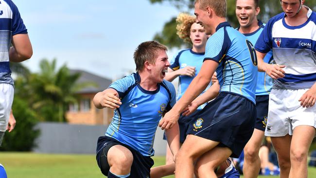 St Columban's Bailey Atkins, right, celebrates a try. Picture, John Gass