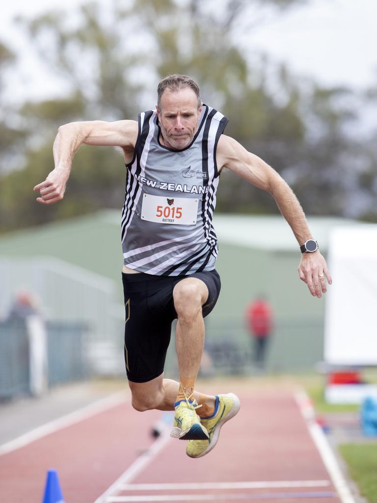 2024 Australian masters games at the Domain Athletics Centre, Iain Rattray 50 NZ during the triple jump. Picture: Chris Kidd