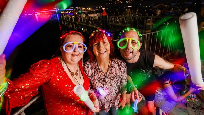 Narelle Franklin, Bernadette Clancy and Marcus Presinski donned strobe lights. Picture: Nicole Cleary