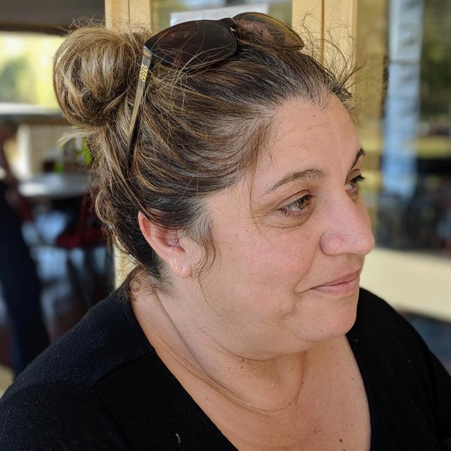 Beechmont evacuee Esterina Segade, 54, has been waiting to hear if her home has survived a fierce bushfire. Picture: Luke Mortimer