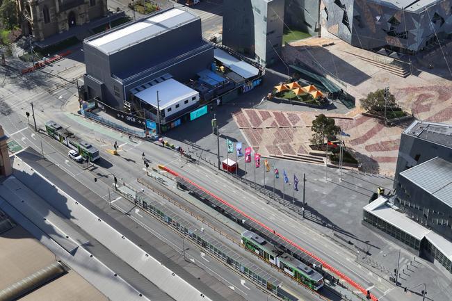 Aerial pictures of empty roads in Melbourne as strict stage 4 lockdowns are enforced. Swanston Street and Federation square. Aaron Francis/The Australian