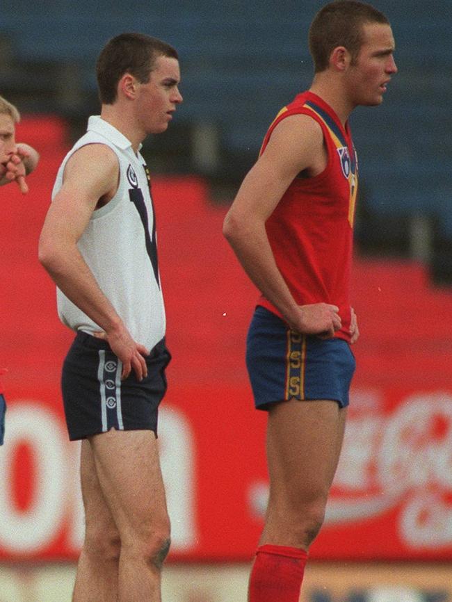 Matthew Scarlett, playing for Victorian Country, lines up one South Australia’s Brad Ottens. A decade later the pair would play in an AFL premiership together.