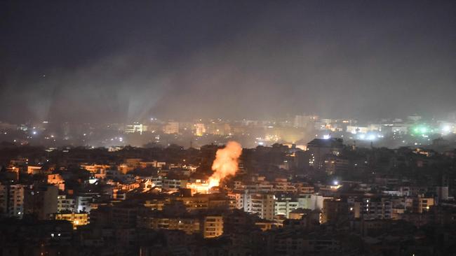 Smoke rises from the site of an Israeli airstrike that targeted a neighborhood in Beirutâs southern suburb early on October 1, 2024. (Photo by Fadel ITANI / AFP)