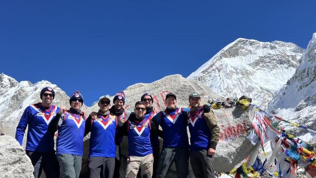 Mitch Herbison, Josh McCann, Kent Agg, Tim Sherman, Scott McLean, Jarrod Westwood, Glen Wallace and James Garvey reached Mt Everest Base Camp wearing South Barwon colours. Picture: Contributed