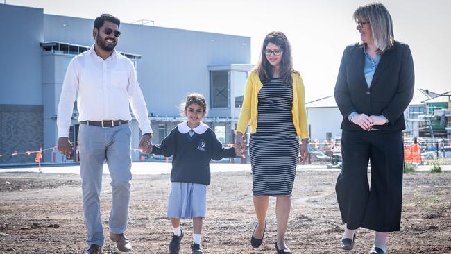 Principal Robyn Kelly (right) with parents Kushagra and Malini Bendale and daughter Anika will be foundation members of the new school community. Picture: Jake Nowakowski