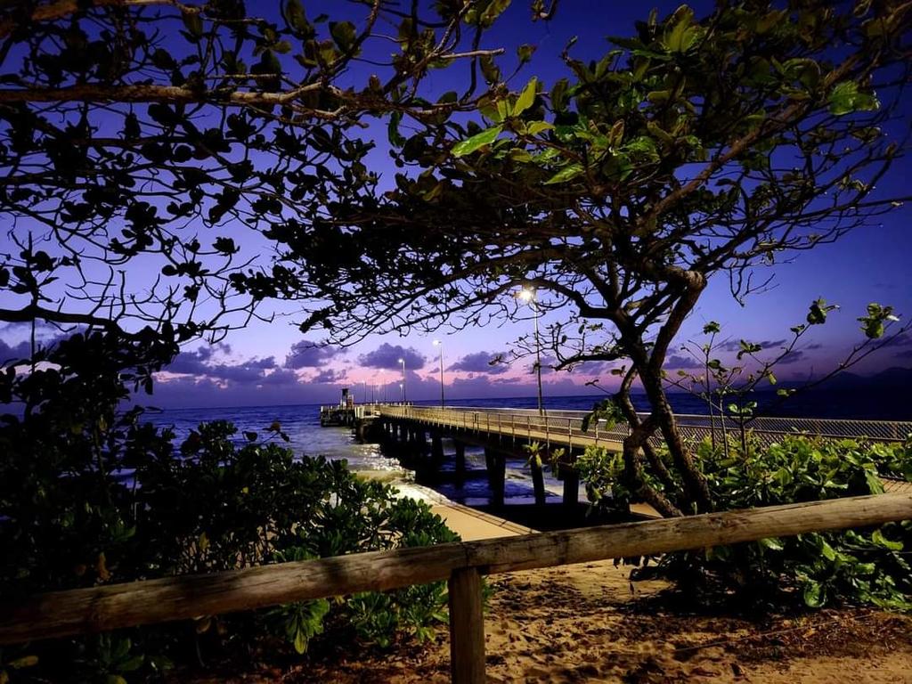 Pre-sunrise at Palm Cove in Far North Queensland. Picture: Ross Palm