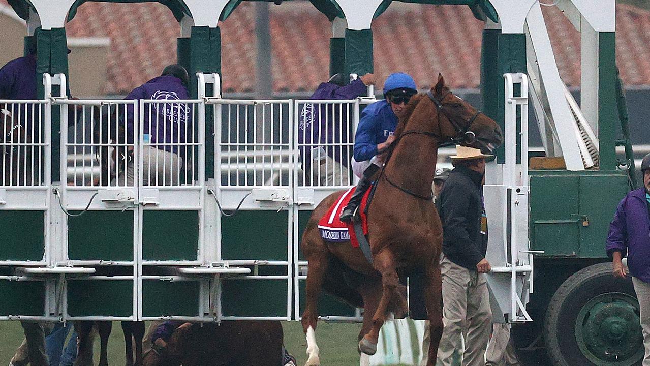 DEL MAR, CALIFORNIA - NOVEMBER 05: Jockey William Buick rides  Modern Games after Albahr in the two hole wouldn't load into the starting gate before the start of the Breeders' Cup Juvenile Turf at Del Mar Race Track on November 05, 2021 in Del Mar, California. (Photo by Rob Carr/Getty Images)