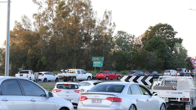 Traffic backs up on the roads into the Peachey Rd roundabout leading onto the M1 at Ormeau. Picture: Glenn Hampson