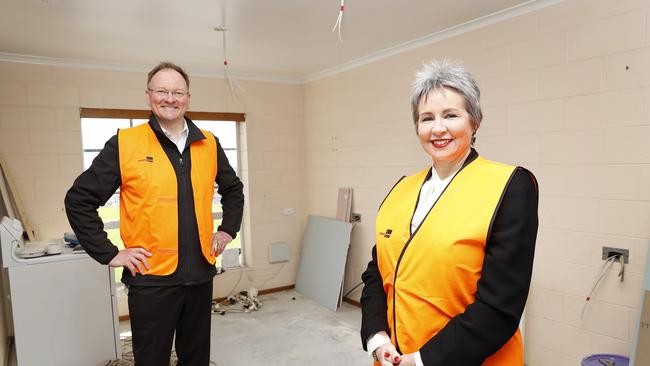 Minister for housing Roger Jaensch and Speaker Sue Hickey inside a public housing unit in Glenorchy that is getting renovated. Picture: Zak Simmonds