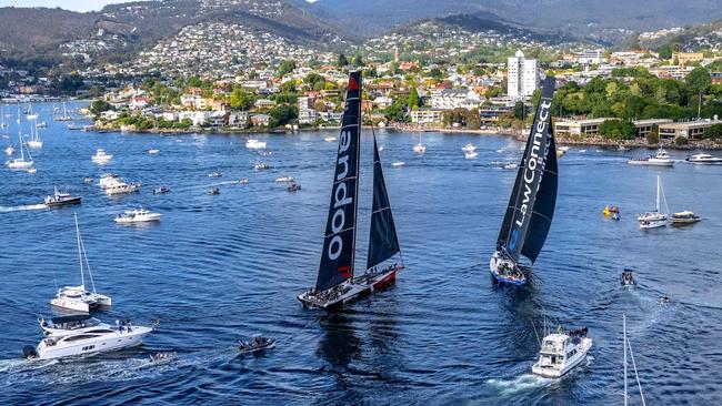 TOPSHOT - This handout image received from Rolex on December 28, 2023 shows yachts Law Connect and Andoo Comanche near the finish line of the annual Sydney to Hobart yacht race in Hobart. (Photo by Andrea Francolini / AFP) / RESTRICTED TO EDITORIAL USE - MANDATORY CREDIT "AFP PHOTO / ROLEX / ANDREA FRANCOLINI" - NO MARKETING NO ADVERTISING CAMPAIGNS - DISTRIBUTED AS A SERVICE TO CLIENTS - NO ARCHIVE