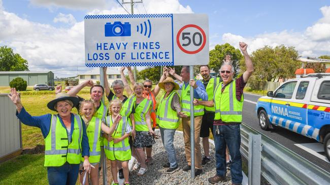 Residents, RMS staff and Member for Clarence Chris Gulaptis celebrate the turning on of the speed camera at Ulmarra.