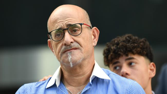 Bob Sakr and son Michael in the background at Parramatta District Court after the sentencing of Samuel Davidson. Picture: Jeremy Piper