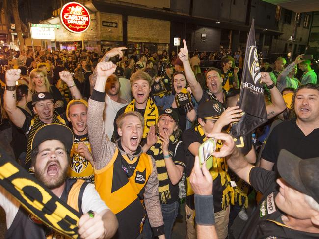 Fans in the street after the clash at the MCG. Picture: Rob Leeson