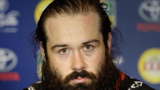 Tigers captain Aaron Woods faces the music.
