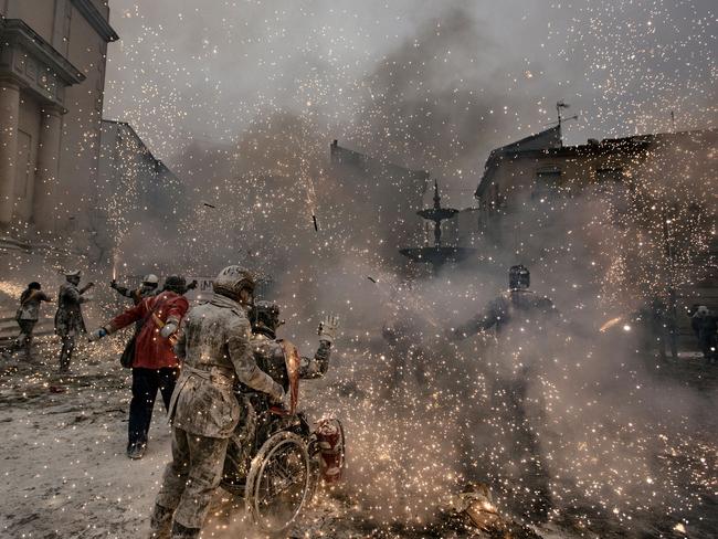 People - Second Prize, Stories Picture: Antonio Gibotta, Agenzia Controluce Title: Enfarinat Story: On 28 December each year, the “Floured War” takes place in Ibi in the province of Alicante, Spain. During the festival, the citizens are divided into two groups: the ‘Enfarinat’ (the floured) group simulates a coup d’etat and a second group tries to calm the rebellion. The teams plays with flour, water, eggs and coloured smoke bombs: the photos taken during the match are beautiful. It has been celebrated since 200 years and it’s linked to the day of the massacre of innocents, when Herod, king of Judea, ordered to kill each baby in order to find Jesus.
