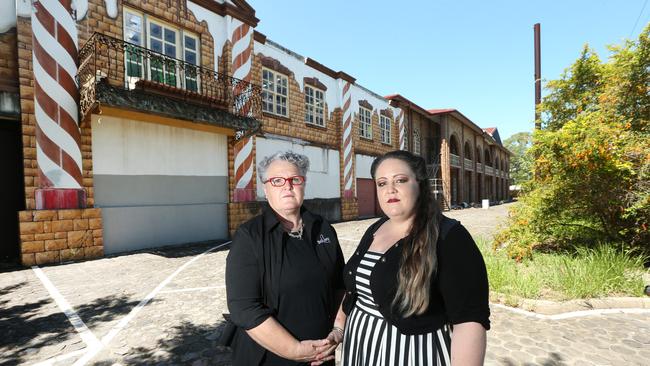 Jaye and Kate Rose at the vacant council-owned building at Loganholme. They want to turn it into a haunted house tourist attraction. (AAP Image/Jono Searle).