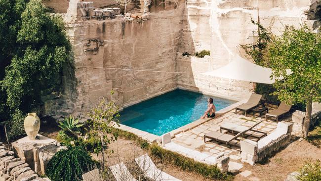 The pool at Zu Nillu, a villa on Favignana set in an ancient tuff-stone quarry. Picture: Jack Johns.