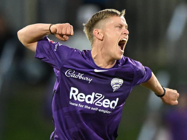 HOBART, AUSTRALIA - JANUARY 23: Nathan Ellis of the Hurricanes celebrates the wicket of Steve Smith of the Sixers during the Men's Big Bash League match between the Hobart Hurricanes and the Sydney Sixers at Blundstone Arena, on January 23, 2023, in Hobart, Australia. (Photo by Steve Bell/Getty Images)