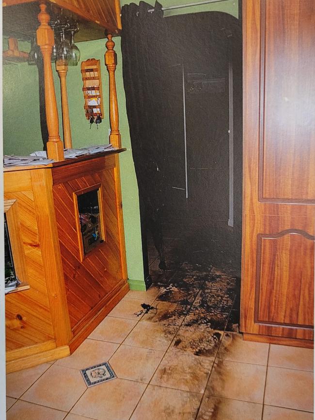 Crime scene images from inside the Alzuain home tendered during the trial show damage, caused by a molotov cocktail thrown into the home on November 20, 2012. Image released by the Supreme Court.