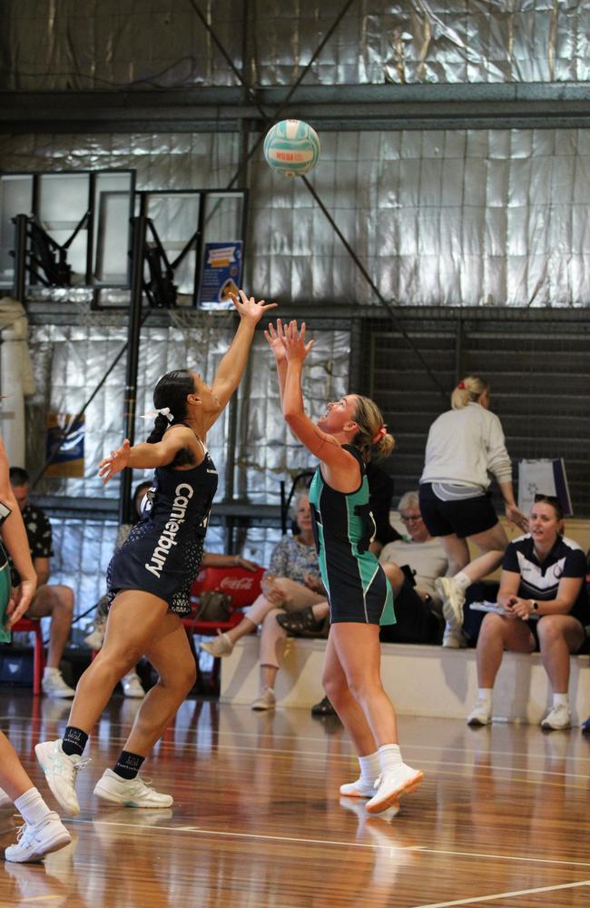 Netball action from QISSN 2024, Townsville. Canterbury's Jasmine Fidow and Matthew Flinder's Charlie Harris