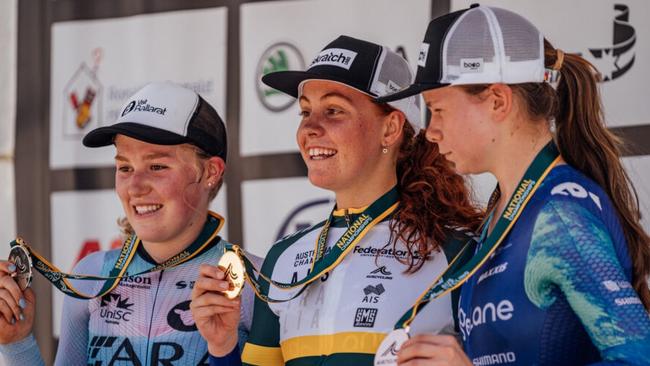 Hobart's Felicity Wilson-Haffenden (centre) with her Road Nats time trial gold medal.