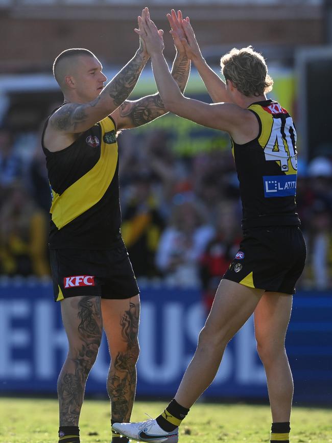 Martin celebrates with Tyler Sonsie after a goal. Photo by Mark Brake/Getty Images