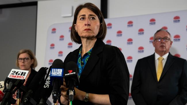 NSW Premier Gladys Berejiklian, with Chief Health Officer, Dr Kerry Chant and NSW Health Minister, Brad Hazzard, at a press conference about the new cases of COVID-19 in Sydney. 18th December 2020 Photo: Janie Barrett