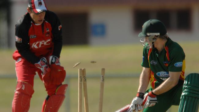 Tasmania's Brady Jones doesn't quite pull off a reverse sweep, much to South Australian keeper Graham Manou's delight, in a T20 match at Gardens in August, 2010. Picture: Stuart Walmsley.