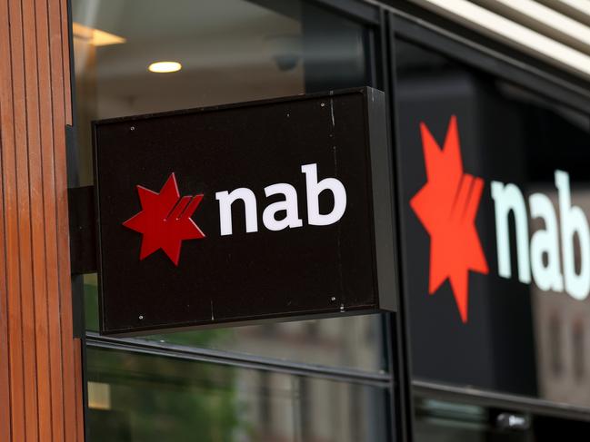 SYDNEY, AUSTRALIA - MARCH 27: The National Australia Bank Ltd. logo at Barangaroo on March 27, 2024 in Sydney, Australia. In the last quarter, Westpac Bank reported a quarterly cash profit of A$1.8 billion, meeting consensus expectations, while NAB experienced a 17% decline in first-quarter cash profit compared to the previous corresponding period, reflecting varying performances among the major Australian banks. (Photo by Brendon Thorne/Getty Images) (Photo by Brendon Thorne/Getty Images)