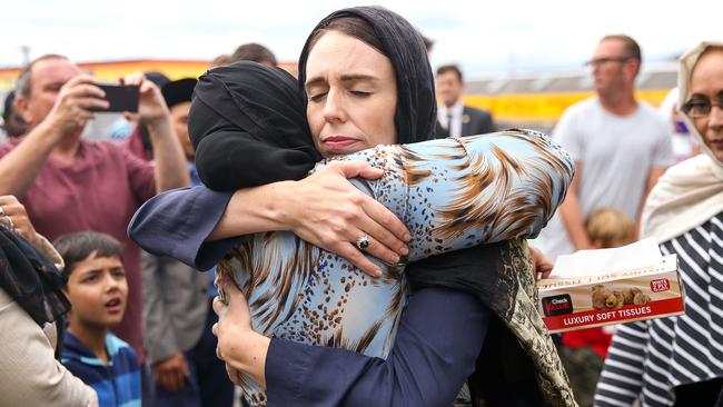 Jacinda Ardern hugs a mosque-goer at the Kilbirnie Mosque on the six-month anniversary of the Christchurch mosque massacre. Picture: Hagen Hopkins