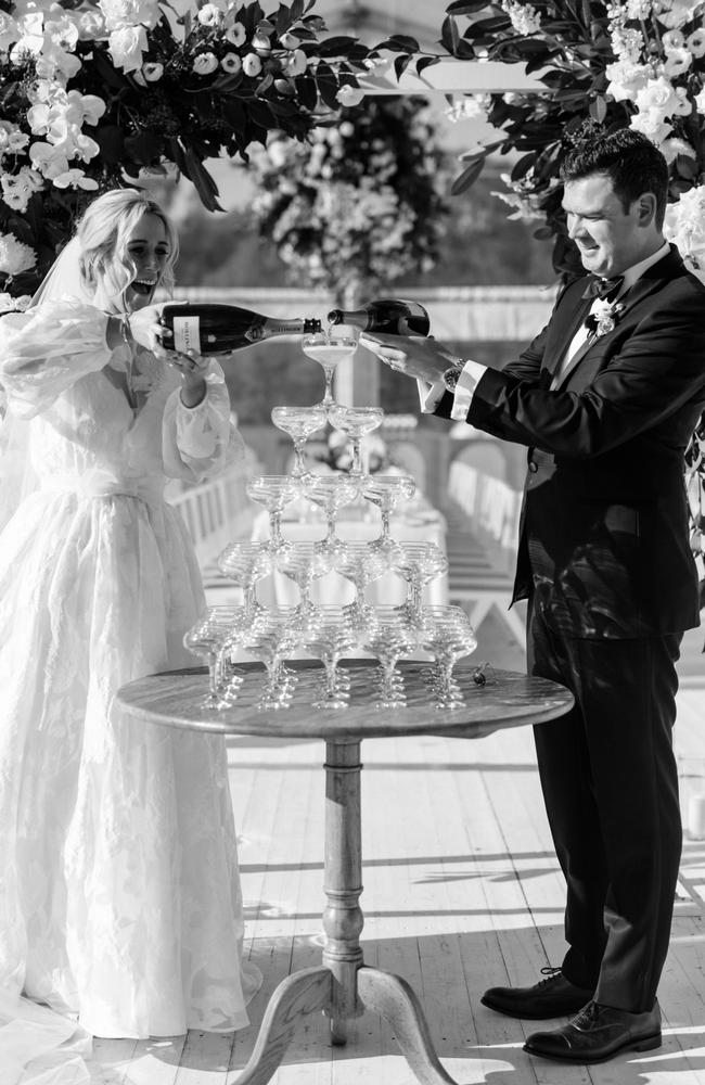 The champagne tower before it smashed at the wedding of Annabelle and William Jones. Picture Cassandra Ladru Photography