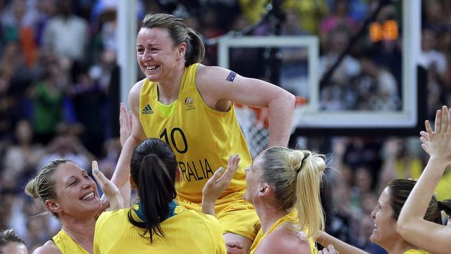 11/08/2012 WIRE: Australia's Kristi Harrower (10) is lifted by teammates after they defeated Russia in a women's bronze medal basketball game at the 2012 Summer Olympics, Saturday, Aug. 11, 2012, in London. (AP Photo/Eric Gay) Pic. Ap