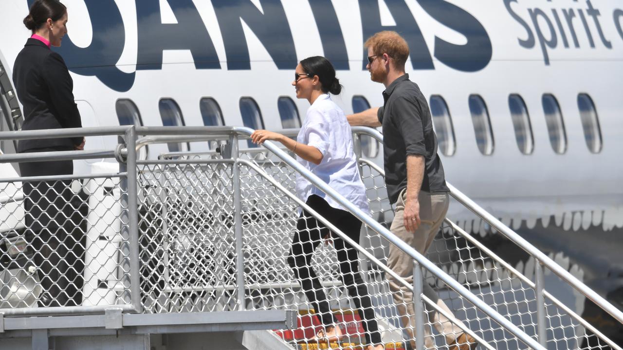 The couple board their flight out of Australia. Picture: AAP