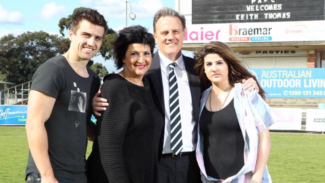 Keith Thomas after being announced as the new CEO with wife Pat, son Brad and daughter Paige in 2011.