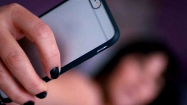 Might ‘be into it’: The woman (not pictured) sent her ex-boyfriend’s new woman a video of them but later admitted it was designed to break them up. (File image)