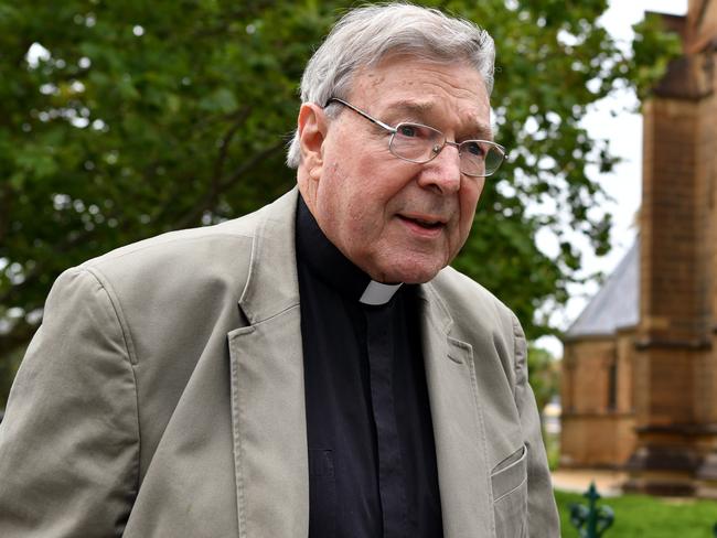 Cardinal George Pell is seen outside St Mary's Cathedral in Sydney, Friday, December 15, 2017. Rev. Anthony Fisher is set to make a statement following the release of the final report into the Royal Commission into Institutional Responses to Child Sexual Abuse. (AAP Image/Joel Carrett) NO ARCHIVING