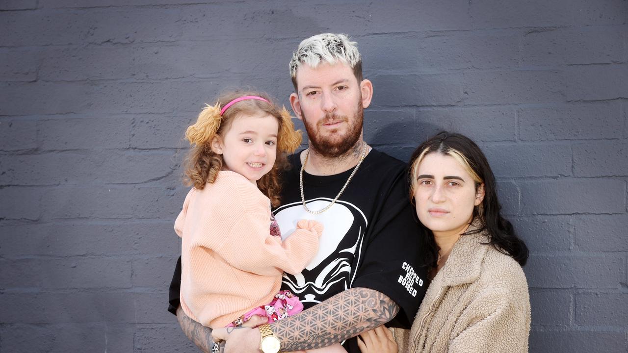 G Houston, his partner Kara Monterosso and their daughter Winnter, 4, are hoping people will donate money to help with his recovery after a motorbike accident. Picture: Alison Wynd