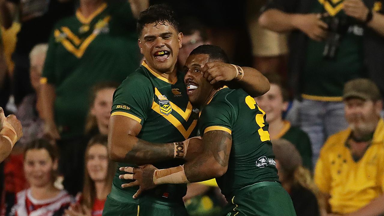 Josh Addo-Carr celebrates after scoring a try with Latrell Mitchell.