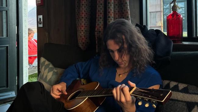 Singer Eddie Benjamin plays guitar – as Bieber appears to use a bong in the background.